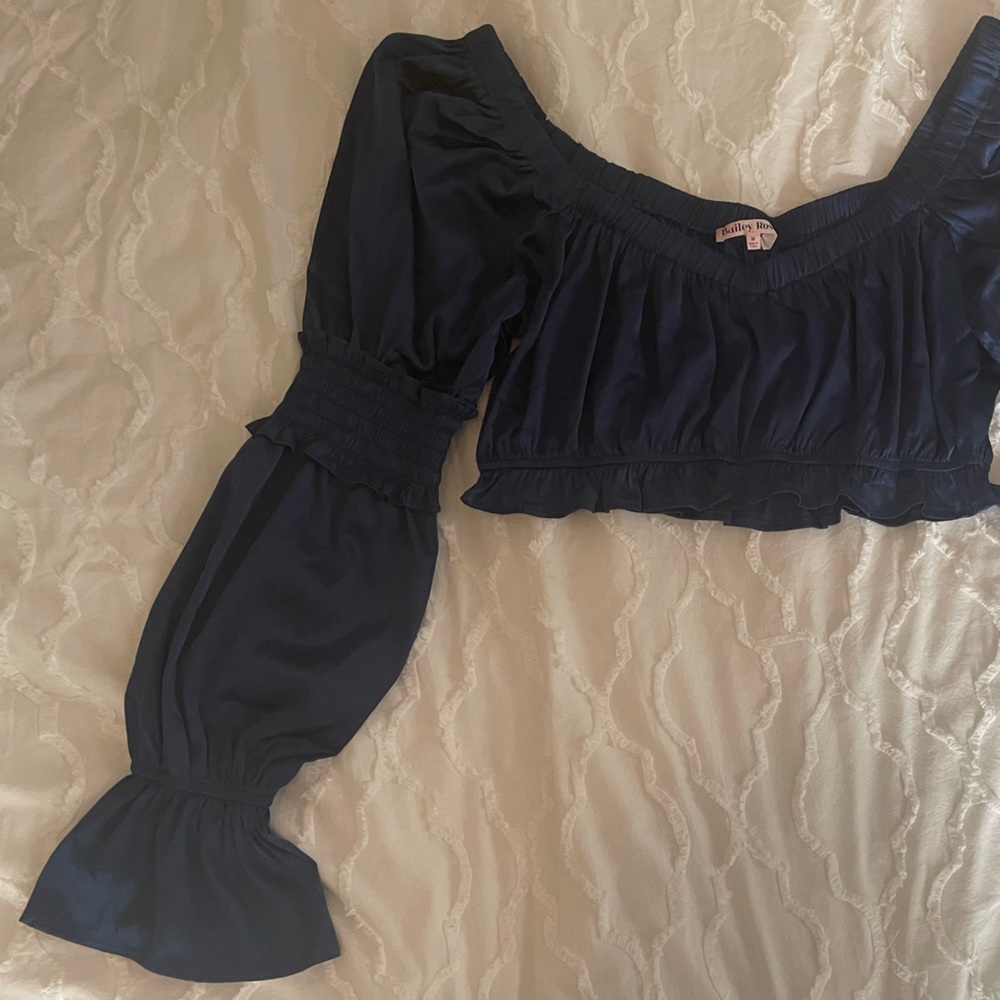 Navy blue silk cropped blouse. Smocking on flared sleeves. Silk